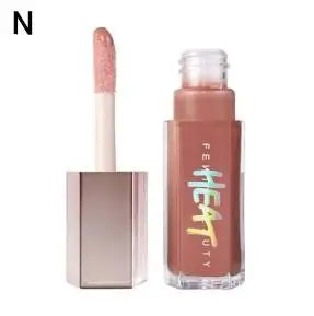 Fenty Beauty Gloss à lèvres soyeux et riche Miel Gloss à lèvres rouge Stardust Poudre compacte pour le contouring Stick illuminateur Diamond Highlighter